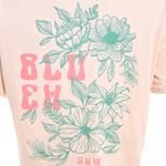 Remera-Snauwaert-Bloem-Lateral